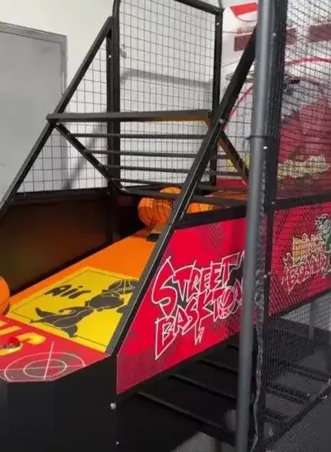 Arcade basketball shooting game machine