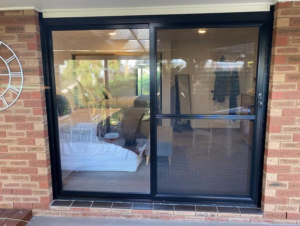 Black-framed Sliding Glass Door — Ingrams Installations in Cootamundra, NSW