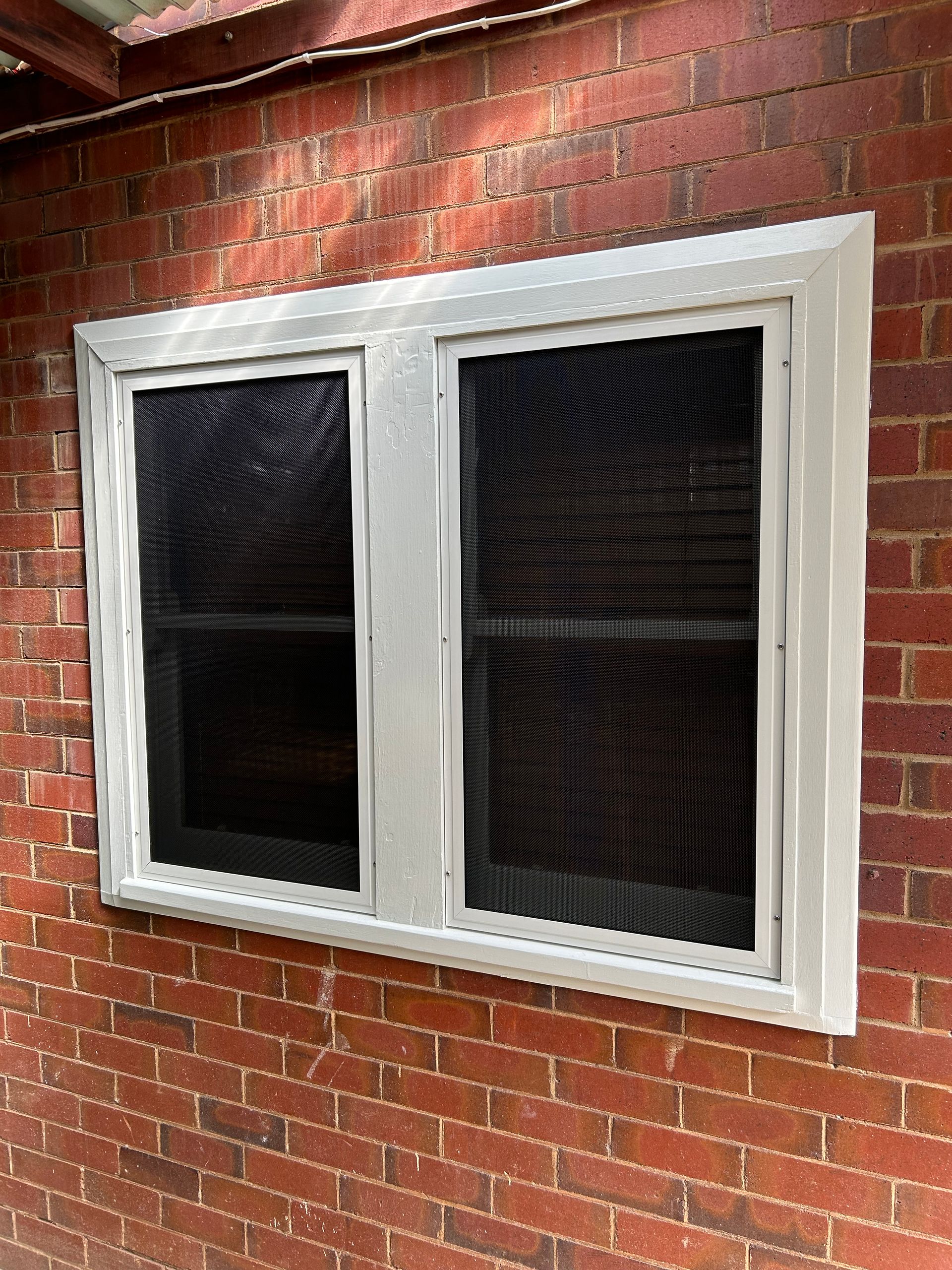 A Security Screen Over A Window — Ingrams Installations in Wagga Wagga, NSW