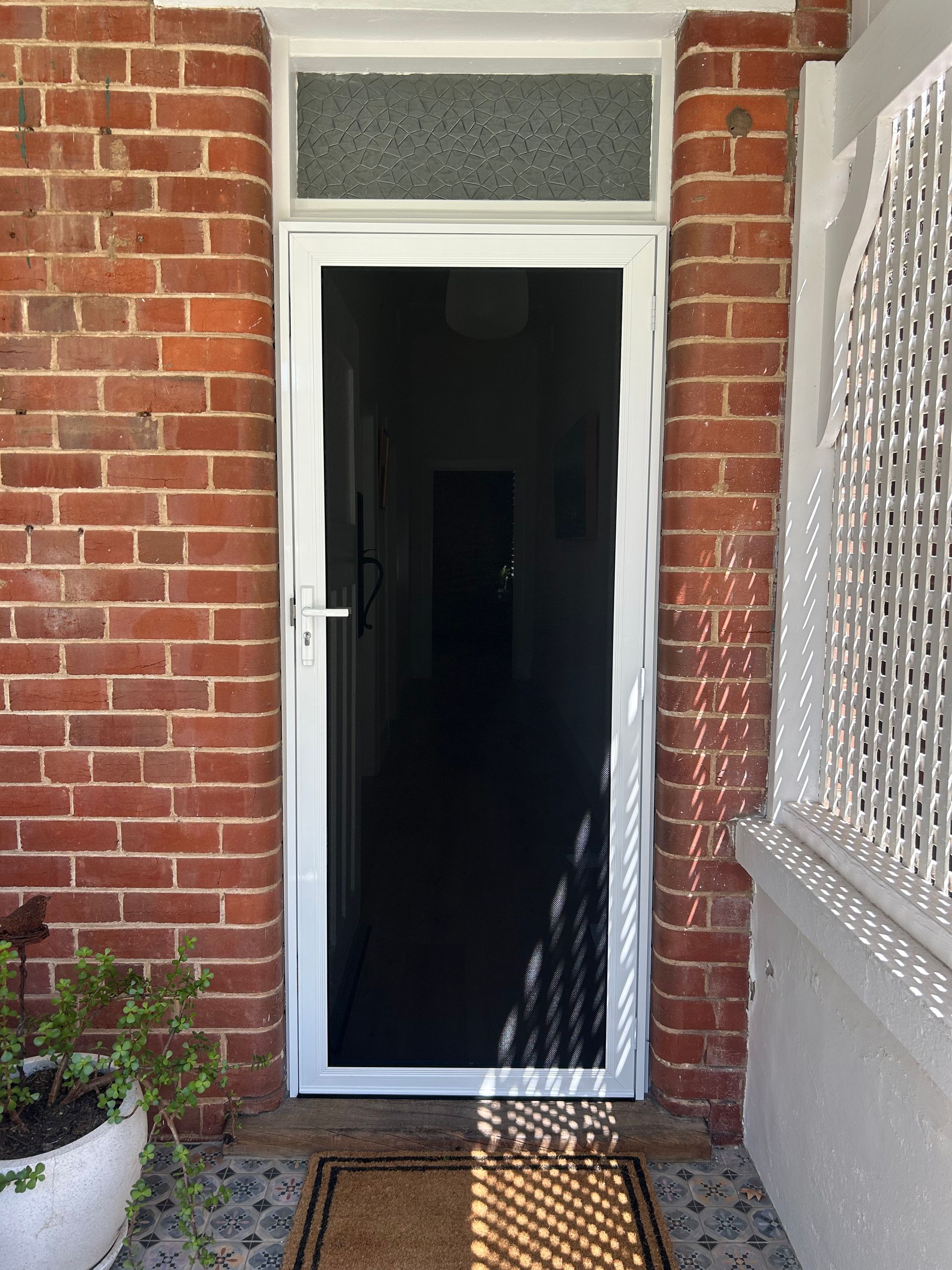 Security Door on a Brick House — Ingrams Installations in Wagga Wagga, NSW