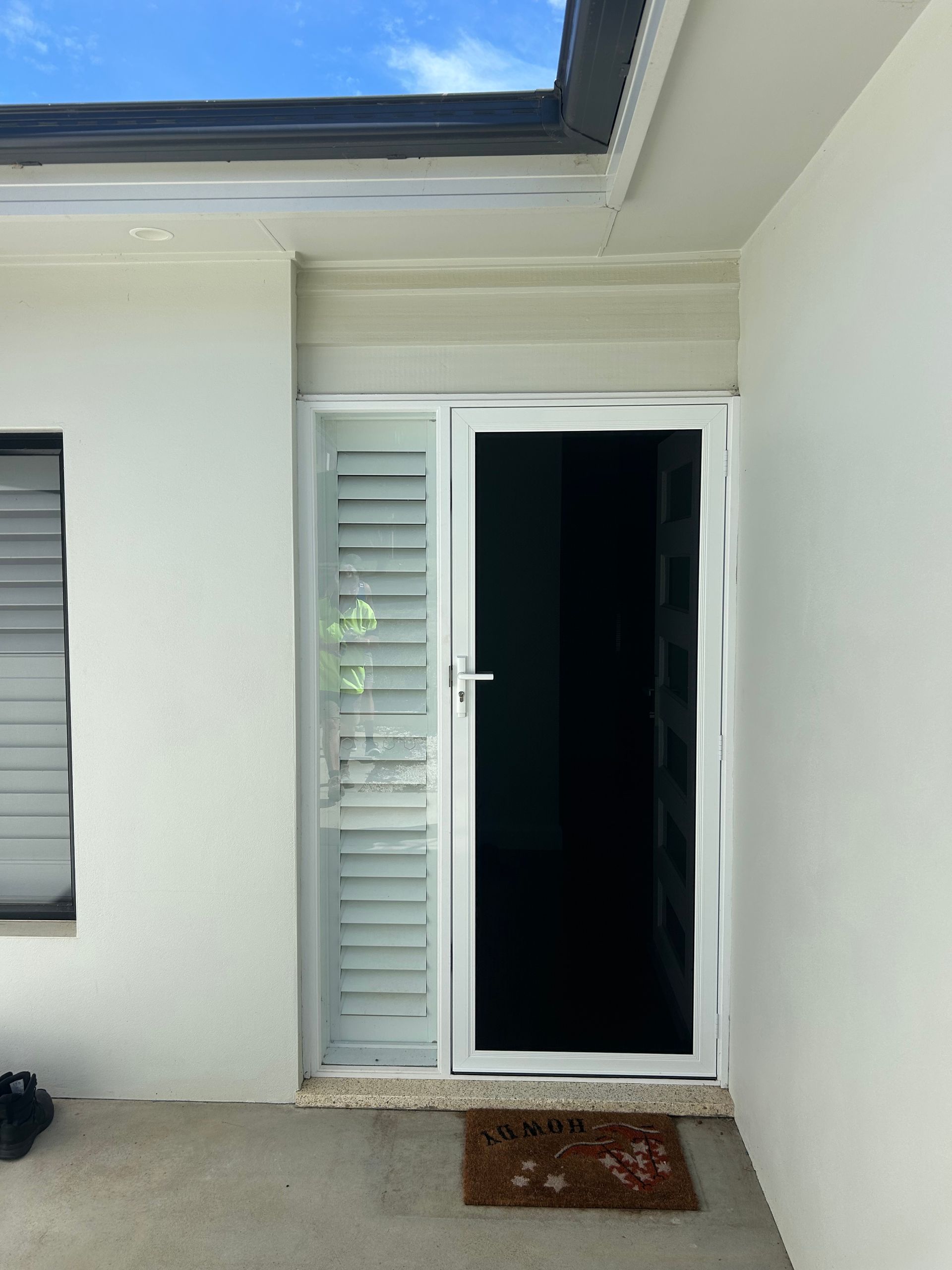 Security Door On A White House— Ingrams Installations in Temora, NSW