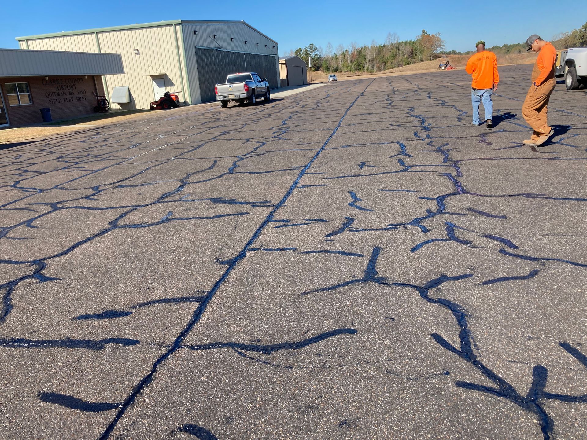 A picture of a mountain with a sun in the background.