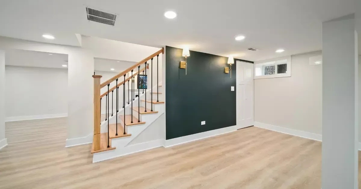 Basement with light flooring and neutral tones to brighten the space