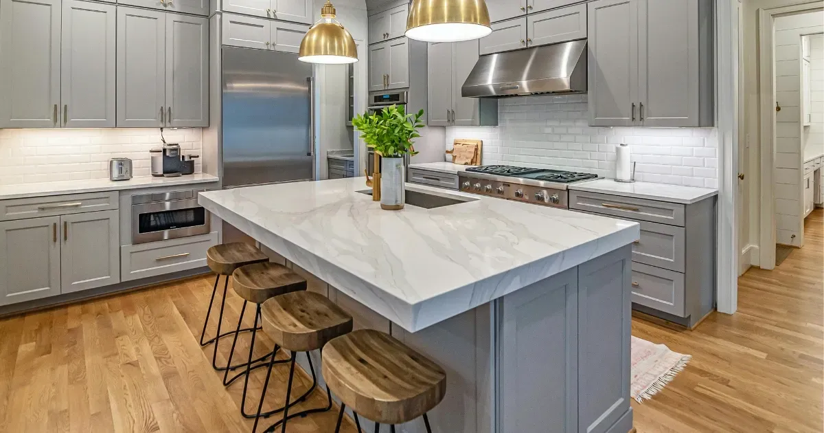 Contemporary kitchen with marble countertop showing ways to customize kitchen island for function