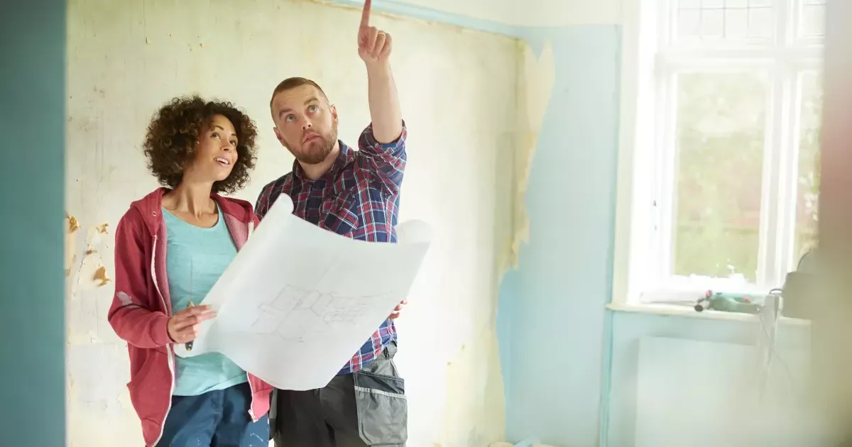 Couple reviewing renovation plans