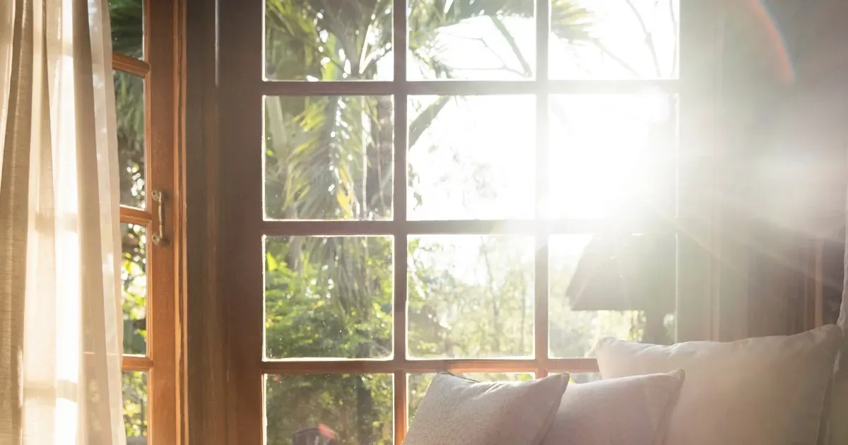 Cozy corner filled with natural light from sunroom additions