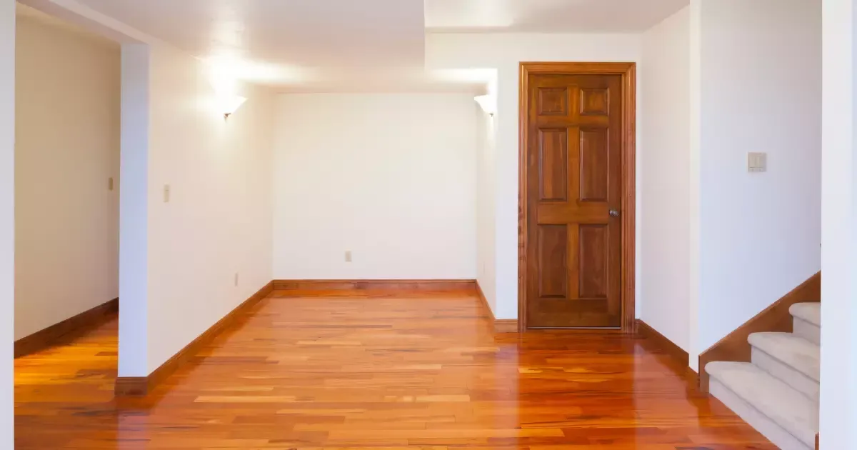 Cozy finished basement with TV and desk
