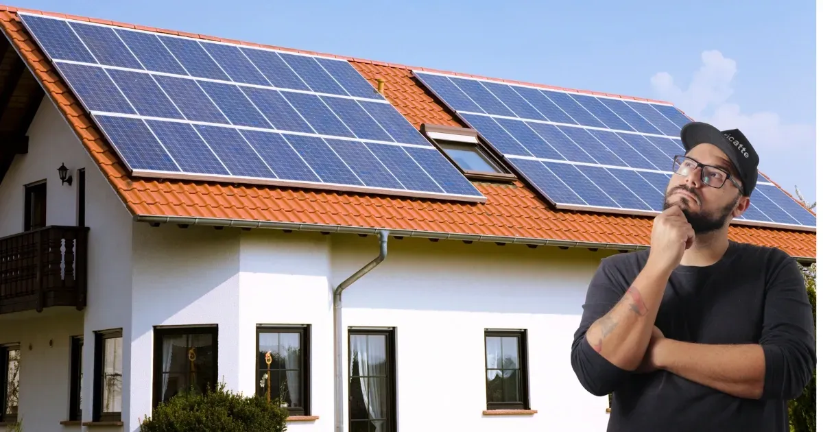 Homeowner comparing different solar panel types for his roof