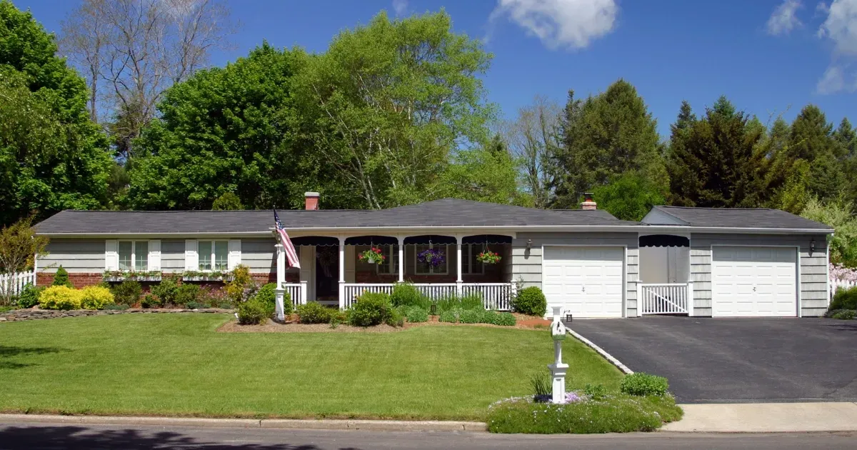 Ranch-style home with a wide front porch showcasing classic ranch-style home plans