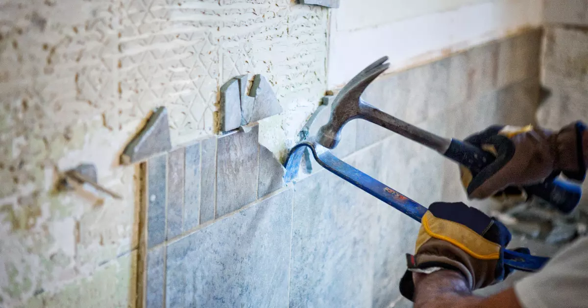 Removing old tiles with hand tools