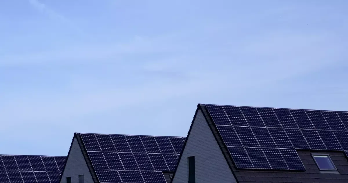 Residential rooftops with solar panels highlighting the future need for solar panel recycling