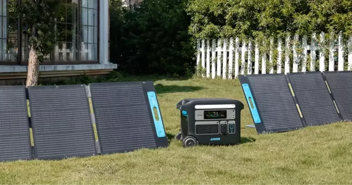 Residential yard setup featuring a solar powered generator with solar panels collecting energy