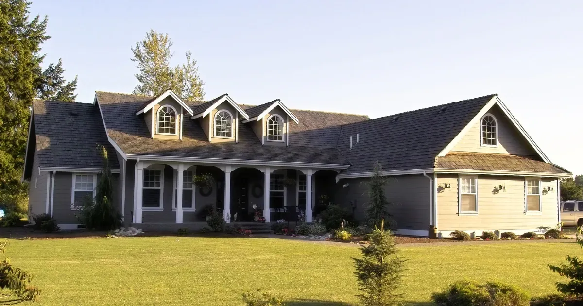 Spacious property featuring a modern take on ranch-style home plans with dormer windows