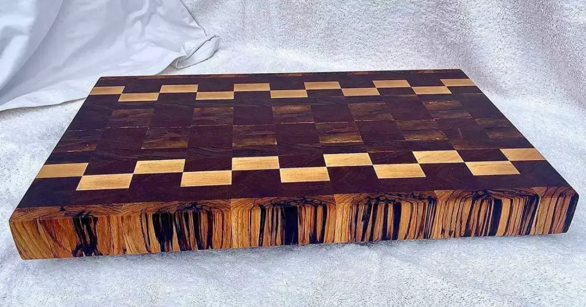 A custom cutting board with a checkerboard pattern
