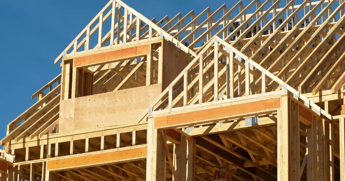 A house under construction with a roof truss
