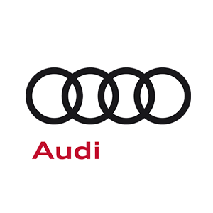 Il logo Audi presenta quattro anelli neri intrecciati sopra il nome del marchio, scritto in rosso su sfondo bianco.