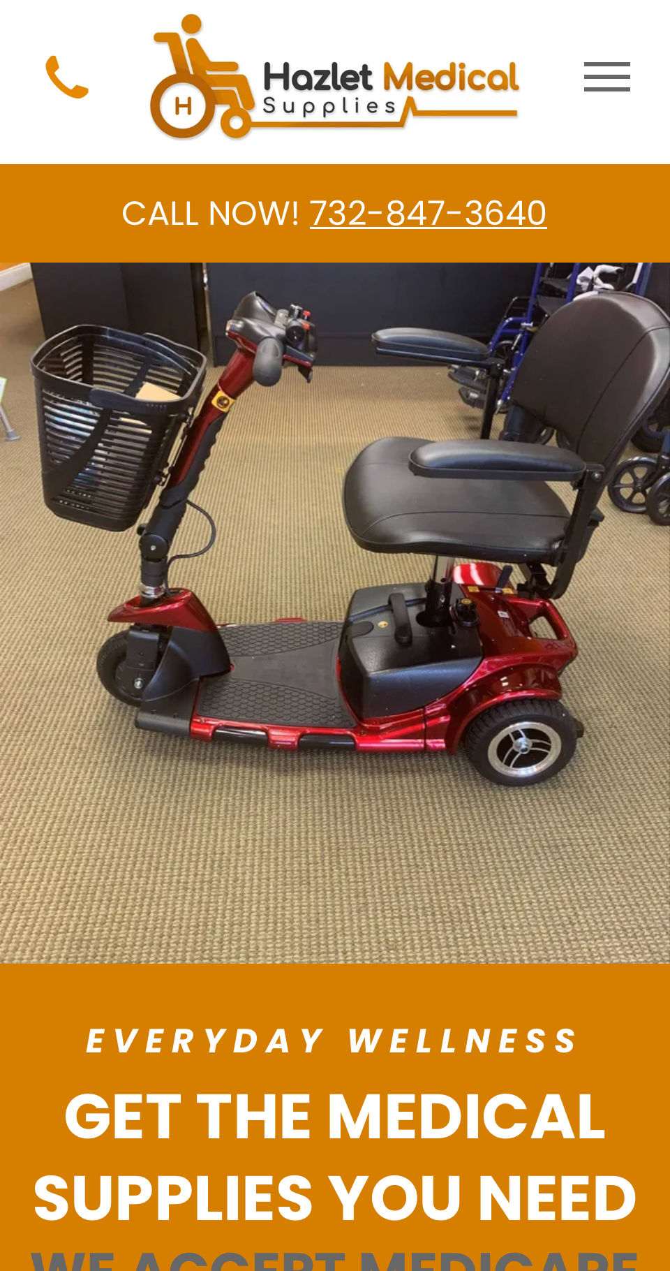 A red mobility scooter with a basket on the front is on a website.