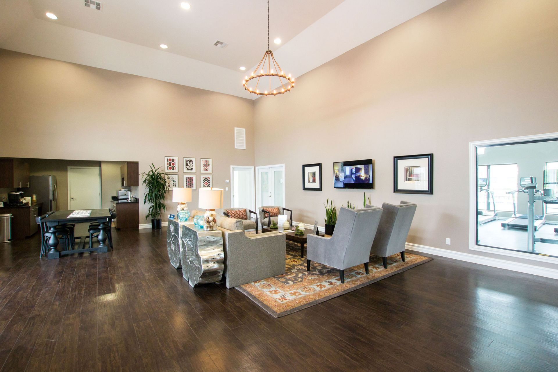 A living room filled with furniture and a television.