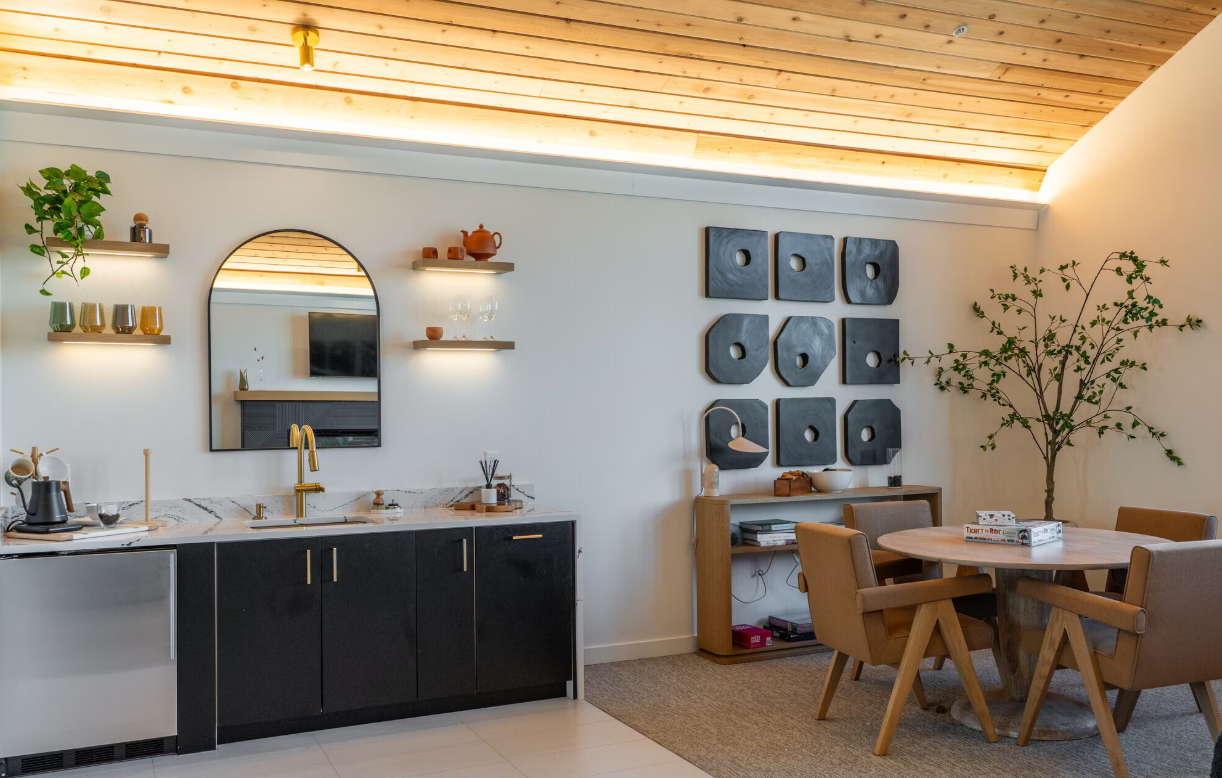 Photo of a kitchen area of an apartment with a vaulted ceiling