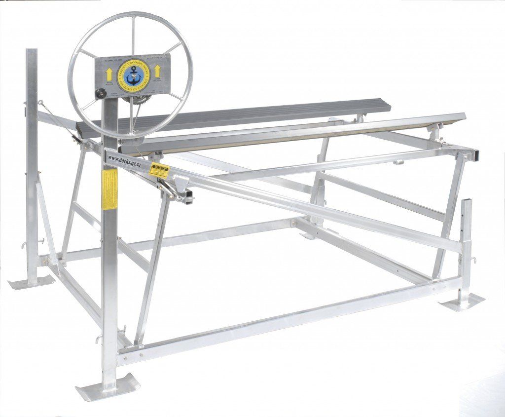 A boat lift with a steering wheel on top of it.