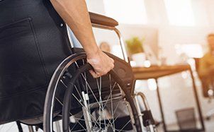 Columbus Ohio Attorneys — Disabled man is sitting in a wheelchair in Columbus, OH
