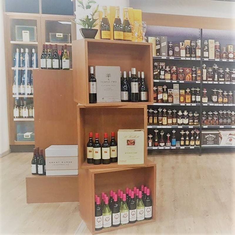 Wine Display In Alcohol Store — DMB Kitchens in Port Macquarie, NSW