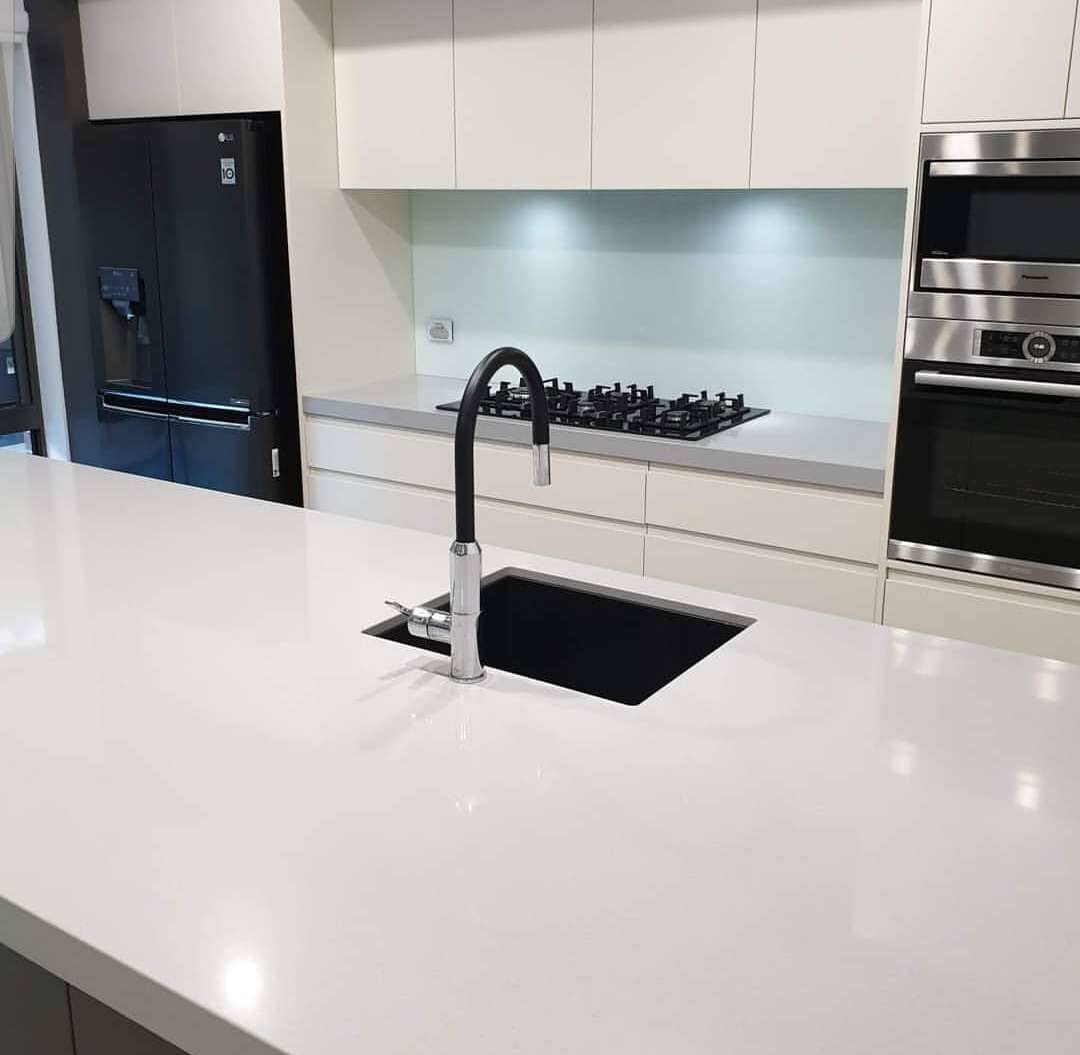 White Marble With Black Sink In Middle — DMB Kitchens in Port Macquarie, NSW