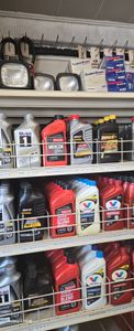 A garage filled with lots of tools and supplies.