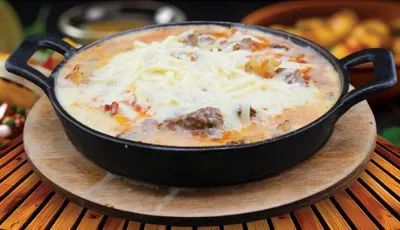 Baked casserole dish with melted cheese