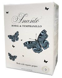 Box of Ananto wine, featuring a cream background and illustrations of dark blue butterflies. Text indicates it is organic Bobal & Tempranillo.