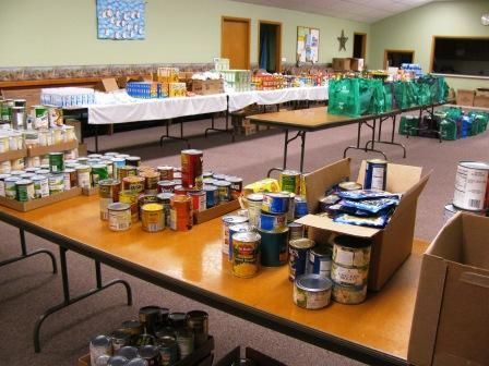 Tables with food items for rural care and share in poplar wisconsin