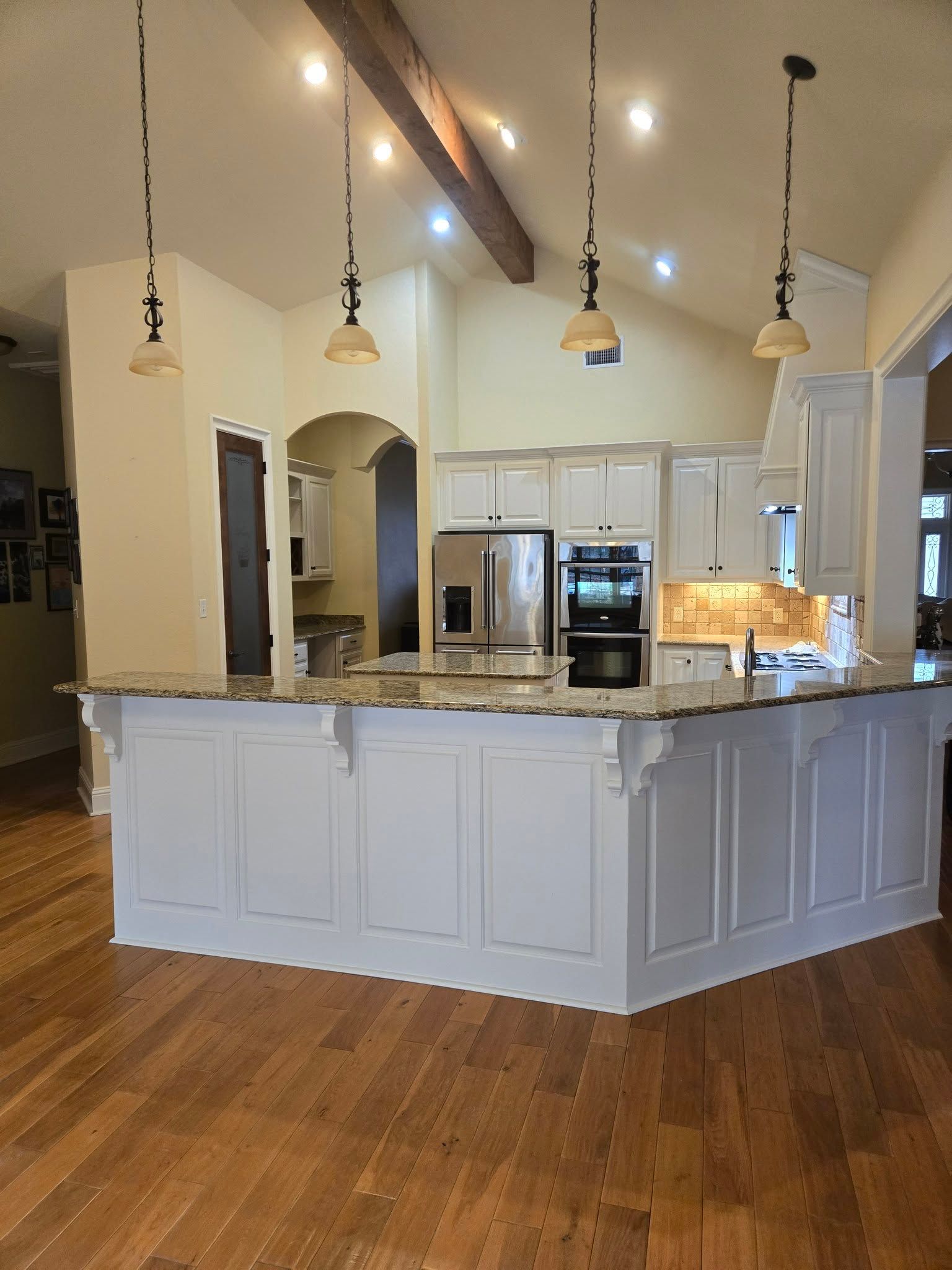 A man is loading boxes into a white van
