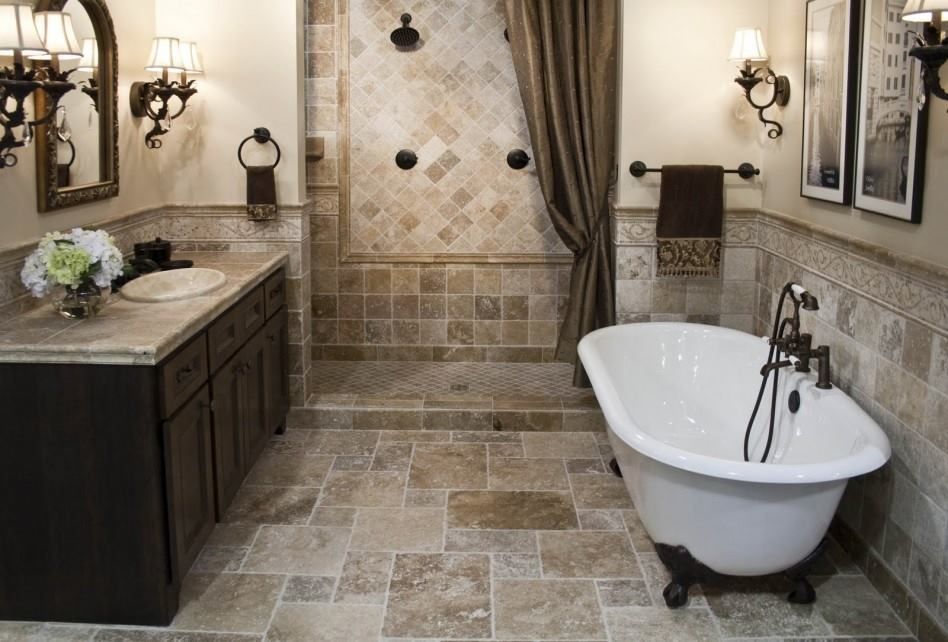 A bathroom with a claw foot tub and a walk in shower.