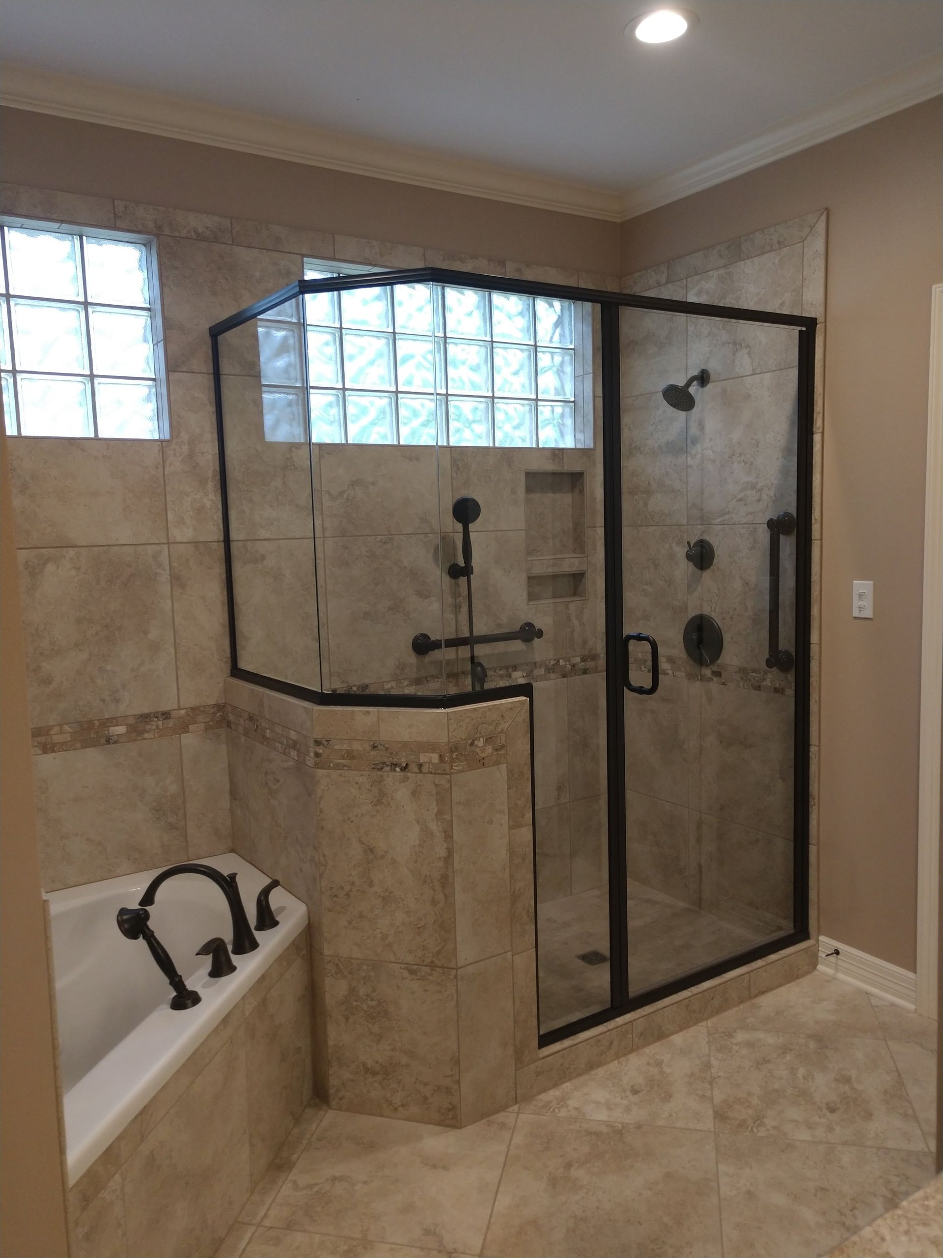 A man is loading a cardboard box into a van.