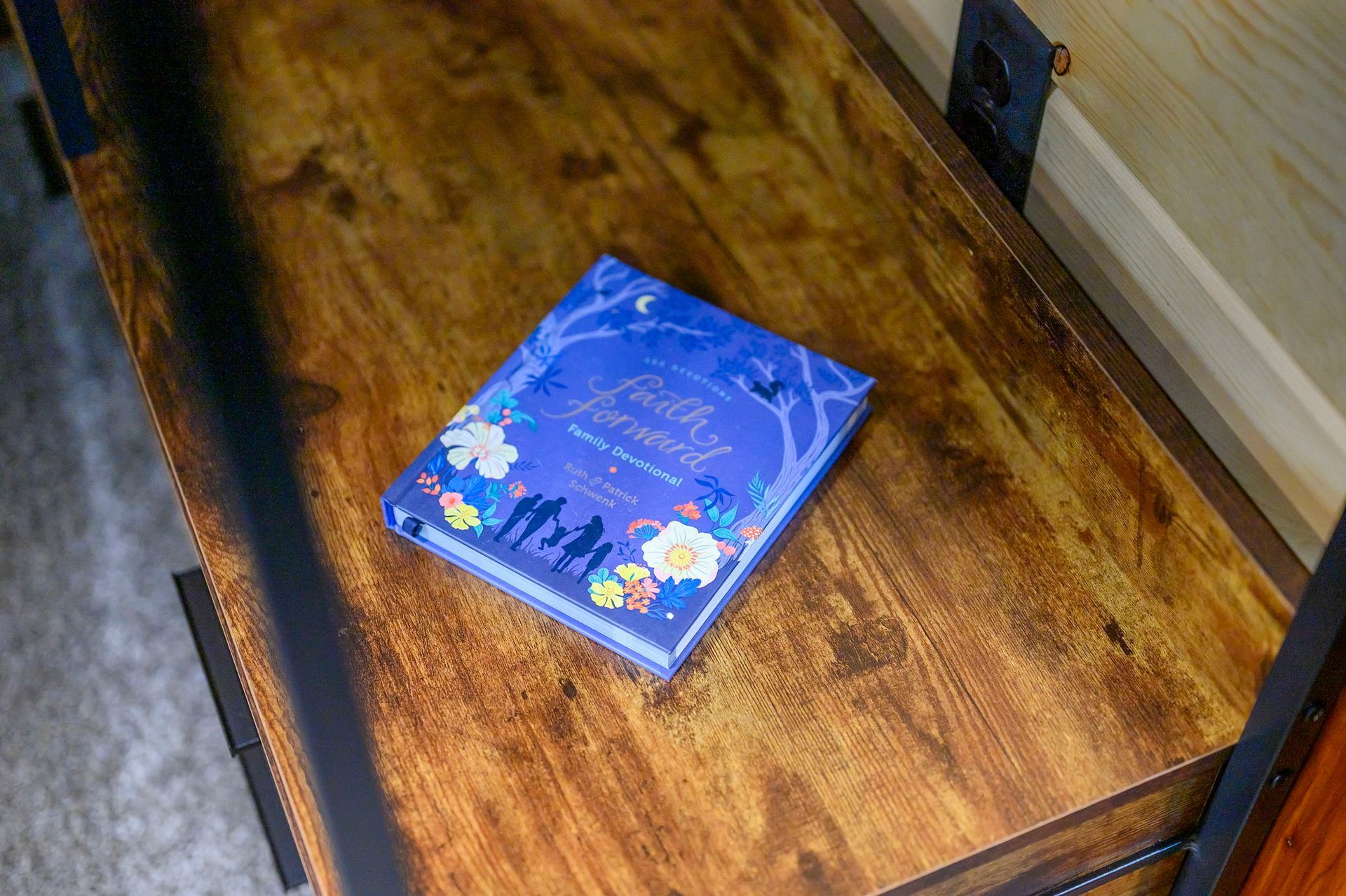 A blue, illustrated book titled 