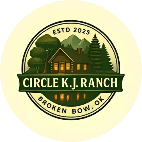 A circular logo for Circle K.J. Ranch in Broken Bow, OK, featuring a cabin, mountains, and trees in green and cream tones.