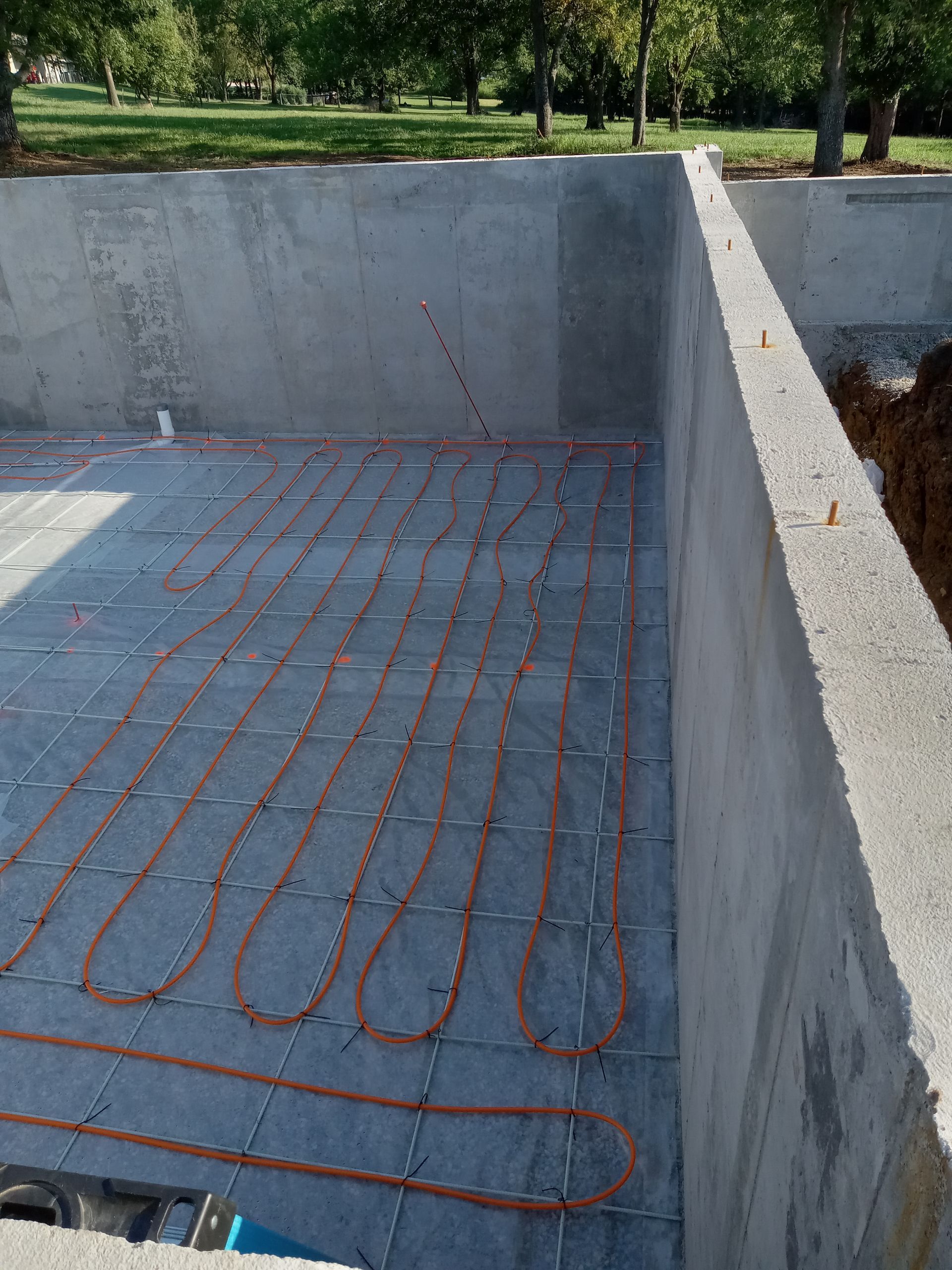 Installation of radiant floor heat in the basement of new construction.