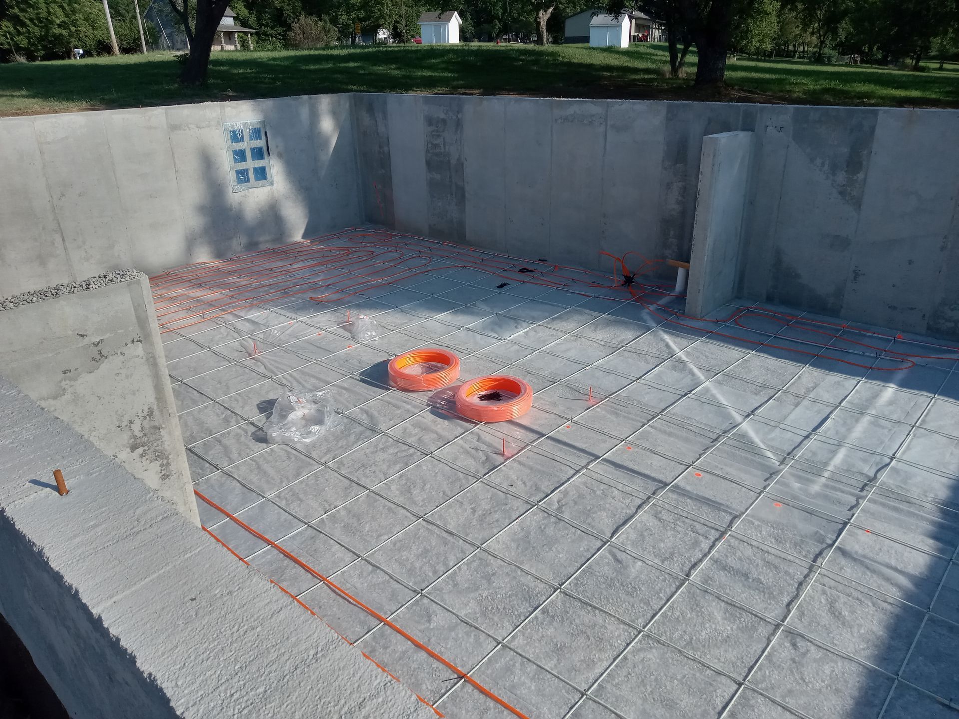 Installation of radiant floor heat in the basement of new construction.