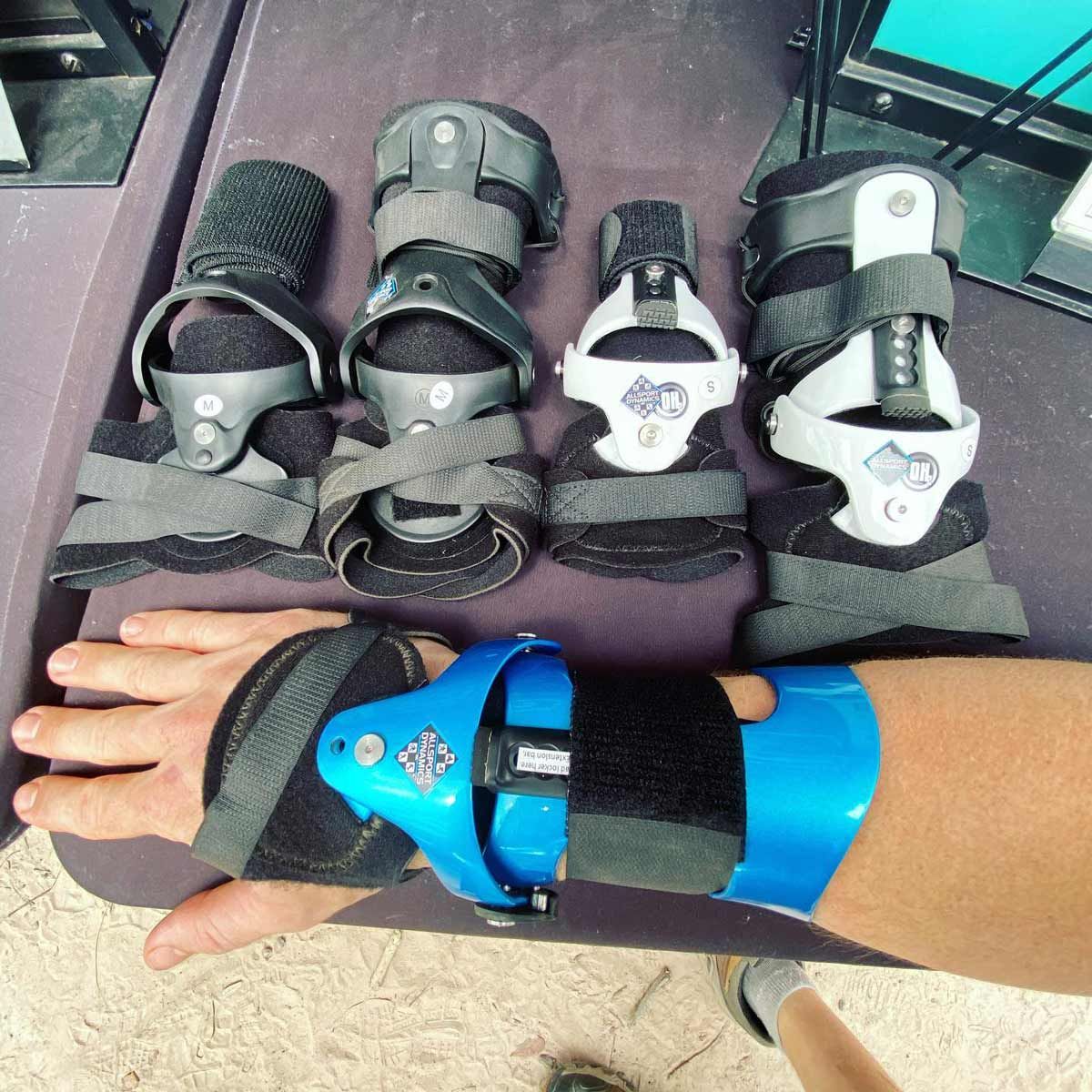 A Person is Wearing a Blue Wrist Brace — Gall Bros Medical in Robina, QLD