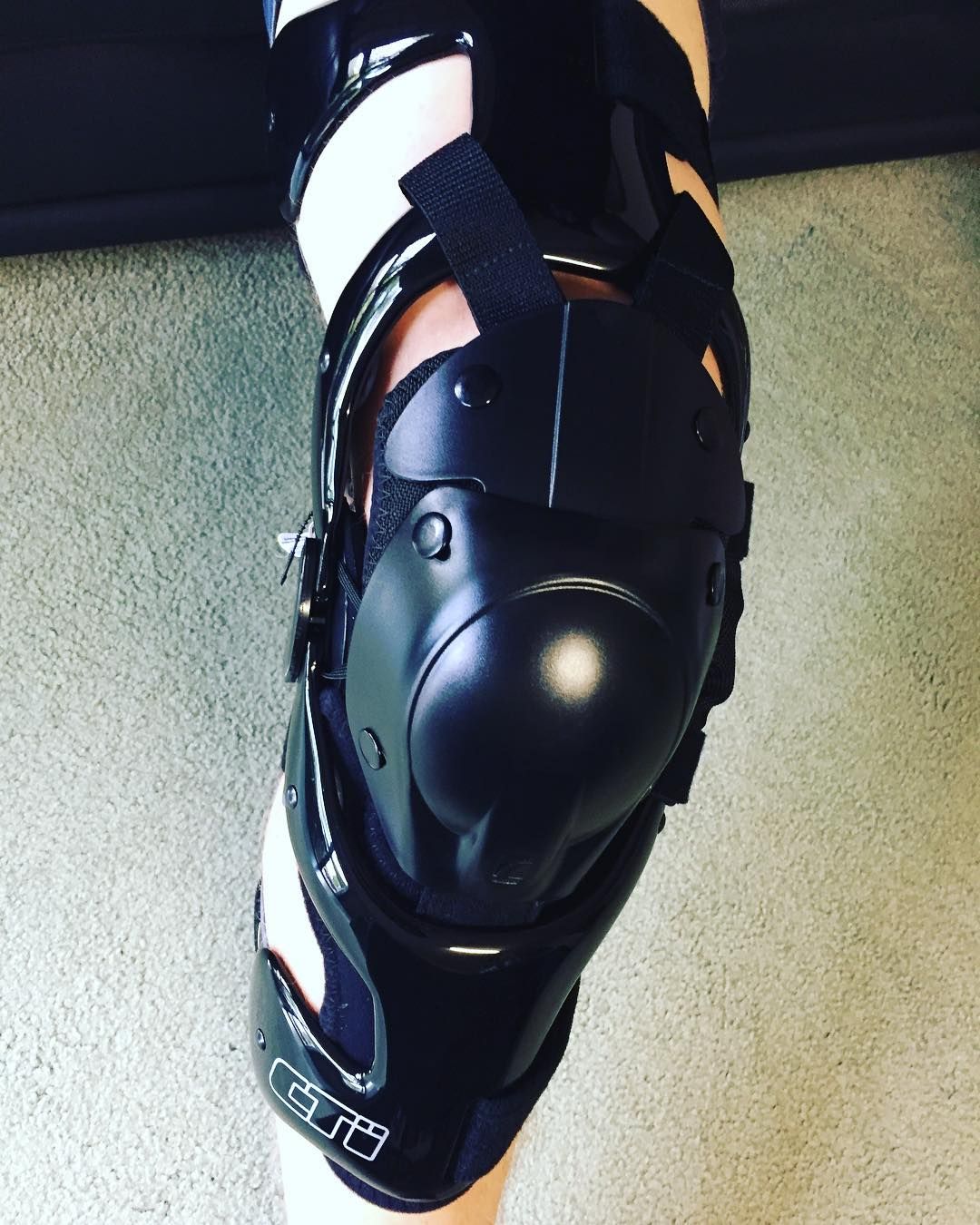 A Close Up of a Person's Knee With a Knee Brace on It — Gall Bros Medical in Robina, QLD