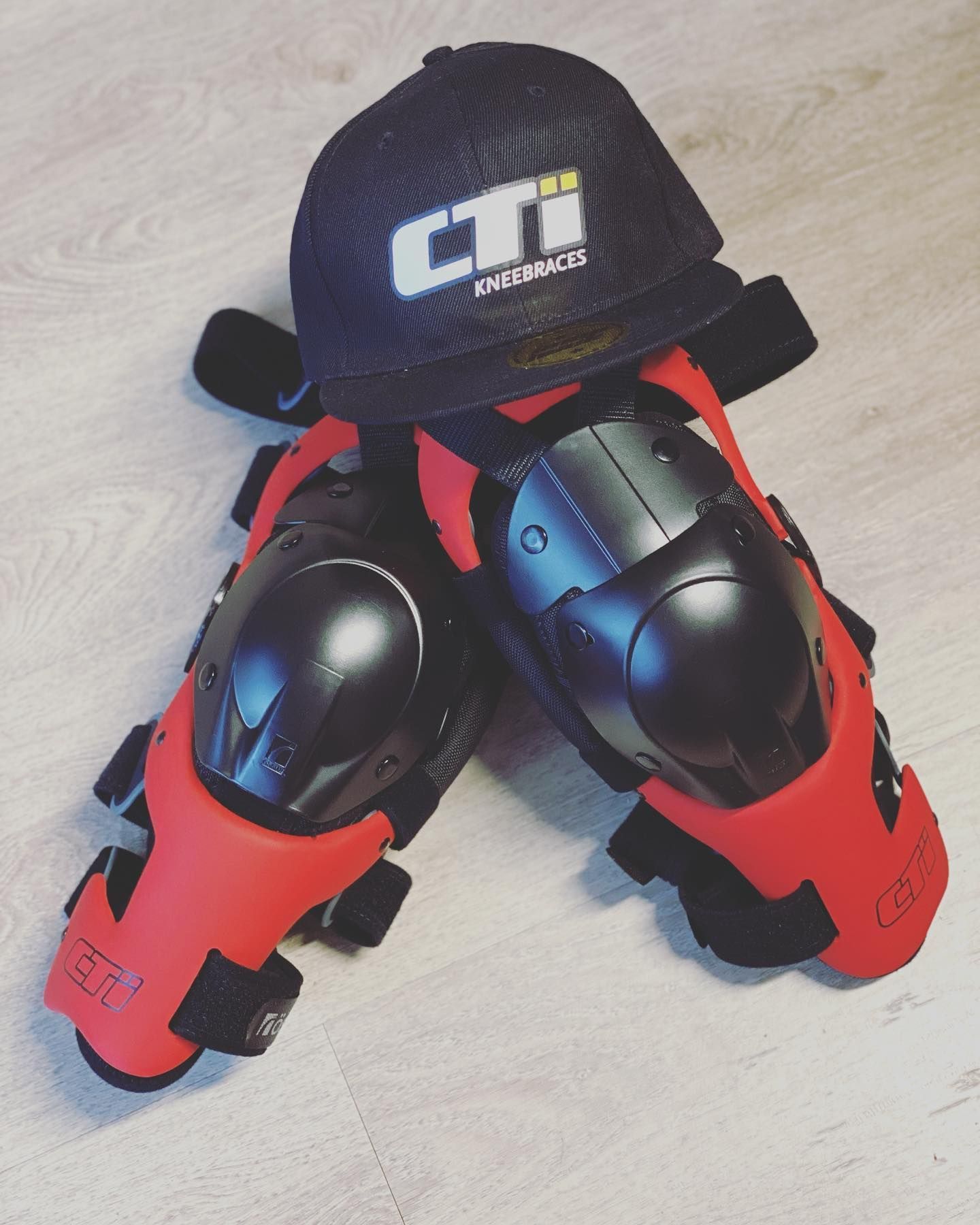 A Pair of Knee Pads and a Hat — Gall Bros Medical in Robina, QLD