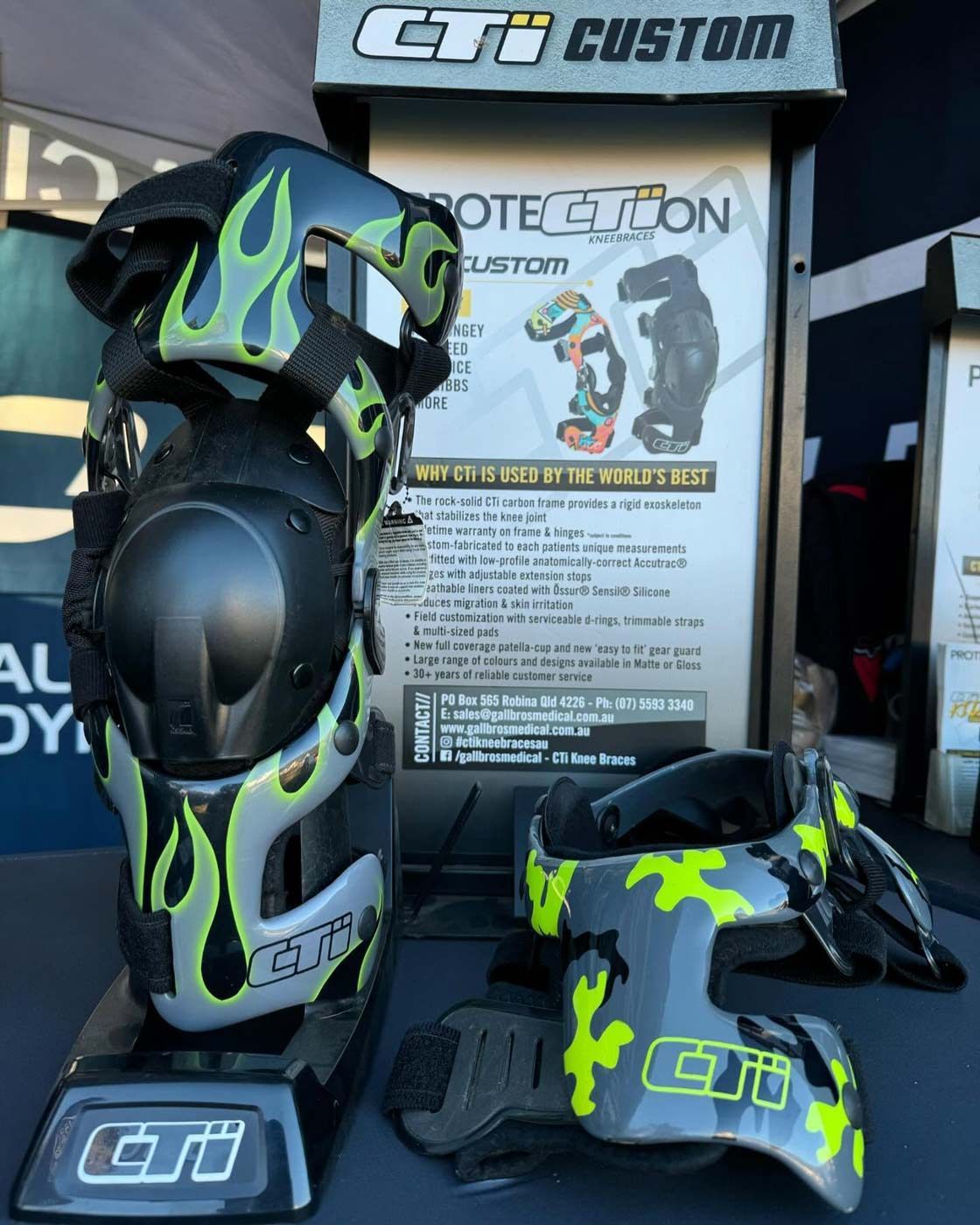 A Pair of Knee Pads and a Helmet Are on Display on a Table — Gall Bros Medical in Robina, QLD