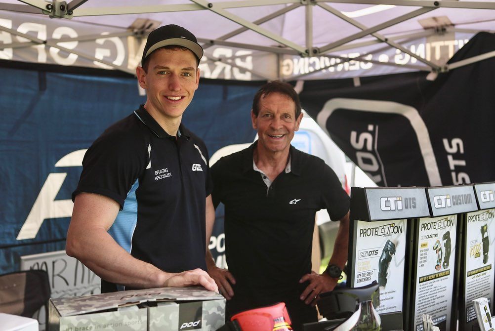 Two Men Standing Next to Each Other in Front of a Tent β Gall Bros Medical in Robina, QLD