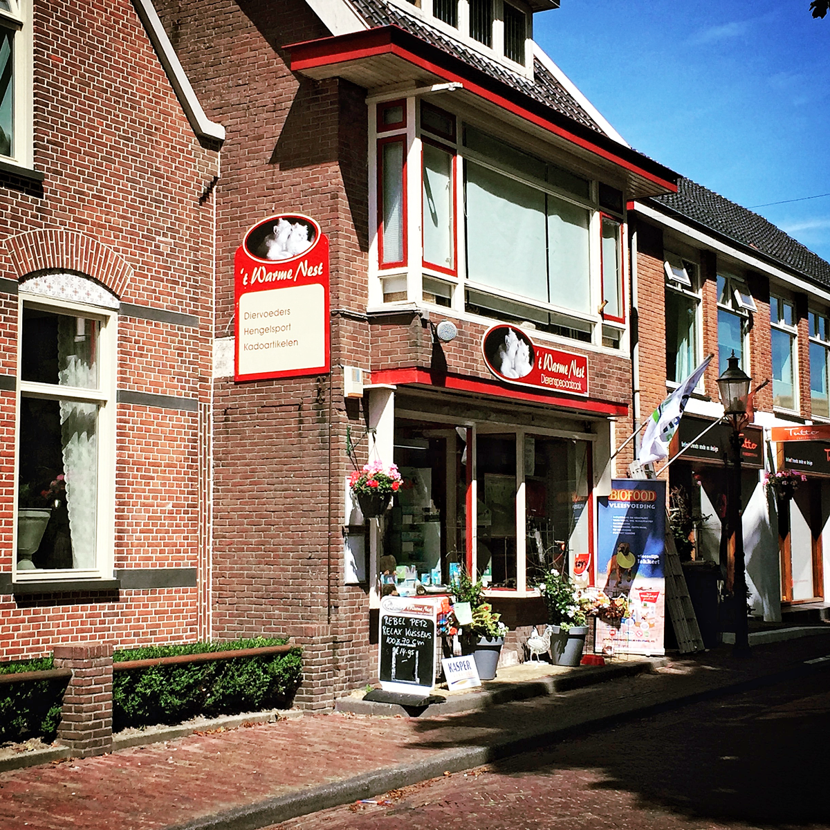 Revisie gevelsignage 't Warme Nest