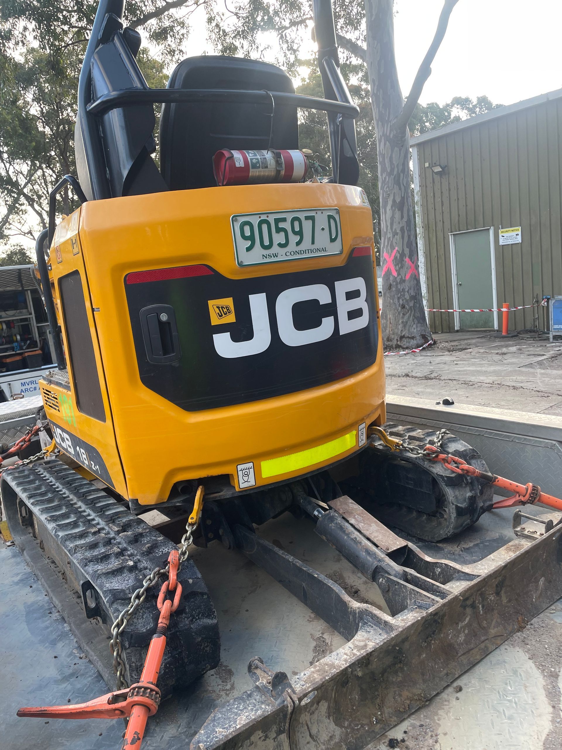 A Person Is Using A Multimeter To Test A Circuit Board — REM Auto Electrics In Cardiff, NSW