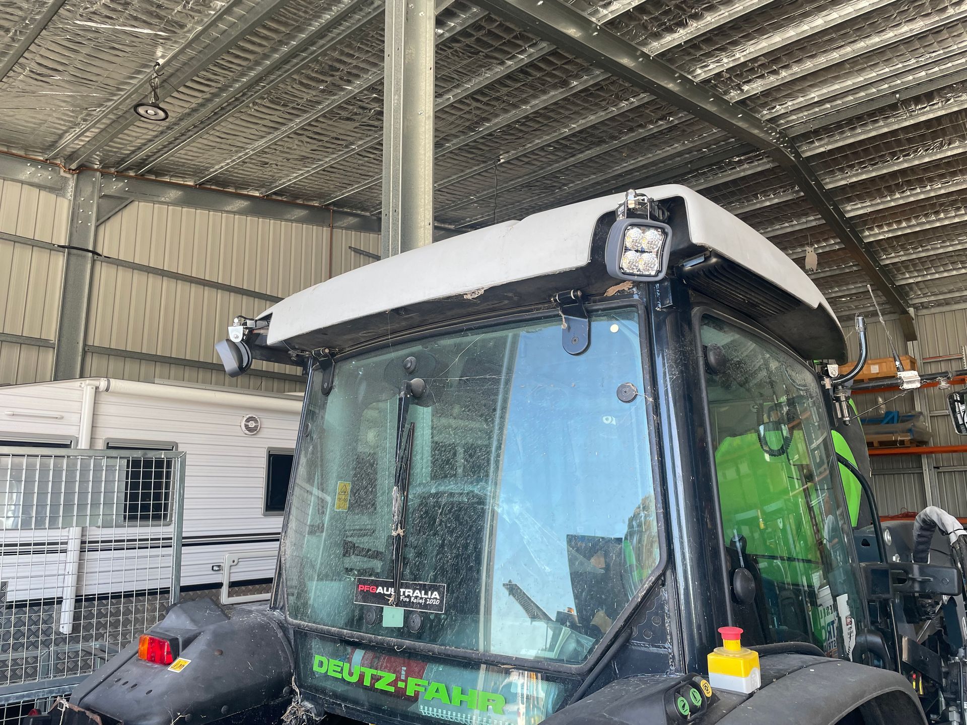 A Person Wearing Gloves Is Working On A Car Engine — REM Auto Electrics In Cardiff, NSW