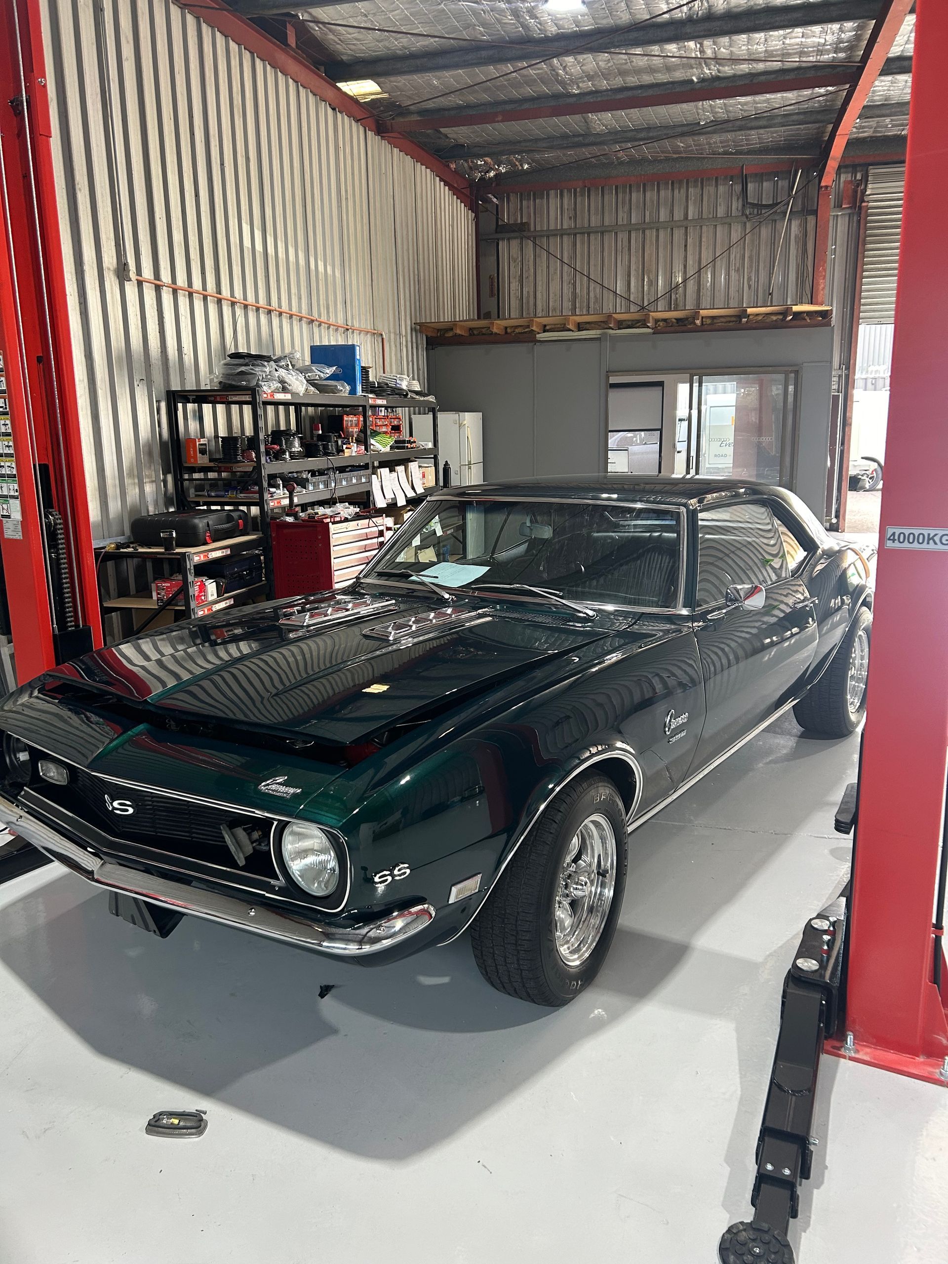 A Red Car With A White Seat And A Red Steering Wheel — REM Auto Electrics In Cardiff, NSW