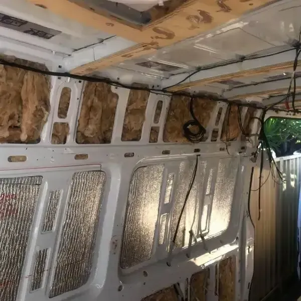 The Inside Of A White Van Is Being Remodeled — REM Auto Electrics In Wallsend, NSW
