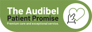 A logo for the audibel patient promise premium care and exceptional service