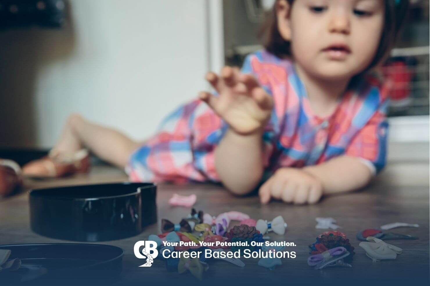 autistic girl sorting small colorful objects on floor, demonstrating focus and repetitive play